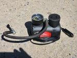 Mobile Air Pump. It Plugs Into The Power Supply You Car. Used. Price: $12.00.