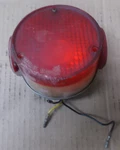 1971-72 Yamaha Tail Lamp Assy. At- Cs- Ct- R5- Tx- Xs OEM#256-84710-61 (007) Used. Price: $19.95.