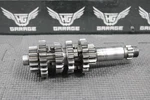 2001 Suzuki RM80 Oem Transmission Tranny Main Center Shaft W Gears Used. Price: $79.99.