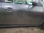 2011 Mazda Right Passenger Side Front Door Assembly Color: Gray 38R Used. Price: $446.50.