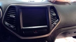 Center Screen Bezel 8'4" W 2 Vents Brass Trim Lhd Fit 14-17 Cherokee 111 Used. Price: $184.00.