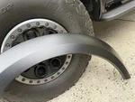 Oem Ford Front Right Fender Flare Molding NL3Z-16038-BB F150 Raptor 21-26 Used. Price: $625.00.