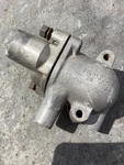 Triumph TR3 Original Thermostat Housing Part No. 33022 C/w Cover Used. Price: $81.56.