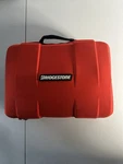 Bridgestone Auto Emergency Kit Portable Air Compressor Jumper Cables New. Price: $45.00.