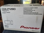 Vintage Pioneer CDX-P1280 Disc Car Changer Text W/ Box New. Price: $180.00.