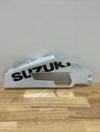 Suzuki Cowling, Under Lh (white) 94500-17K00-YWW Used. Price: $102.99.