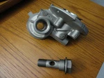 AUC16482 John Deere S120 Briggs & Stratton 22HP Ez Change Oil Filt Adapt W/bolt Used. Price: $25.00.