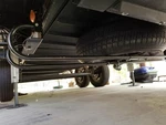 Below Frame Hide Spare Tire Storage System For Rvs Trailers W/ 68-75" Rails Used. Price: $289.95.