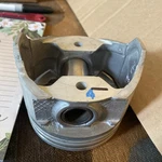 (1111) Oem Piston New Ford E43E6110-AL. Price: $50.00.