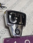 Triumph GT6 MK.1 Rear Body Emblem 619860 Used. Price: $39.50.