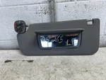 2024 Gmc SIERRA350 Driver Left Side Medium Gray Cloth Sun Visor W/lighted Mirror Used. Price: $74.95.